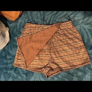 Plaid style skort cute with some sheer tights